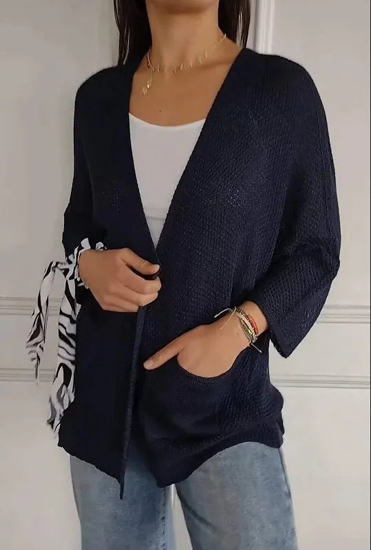 Women's thin waffle weave cardigan coat in army green with nine-quarter sleeves and pockets.