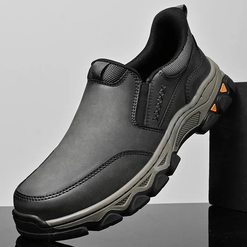 Men's dark brown casual leather-look shoes with round toe and flat rubber sole.