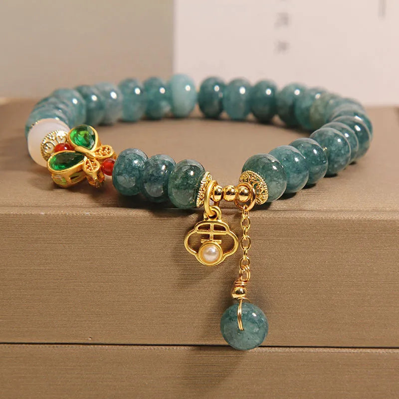 Blue water jade abacus beads crystal bracelet with white agate and rhinestone accents on alloy