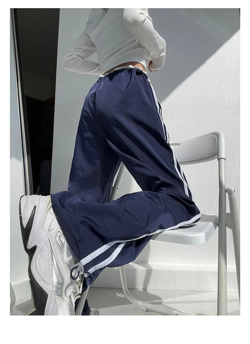 Women's slim straight trousers with parallel bar pattern in thin ribbed fabric, low waist design