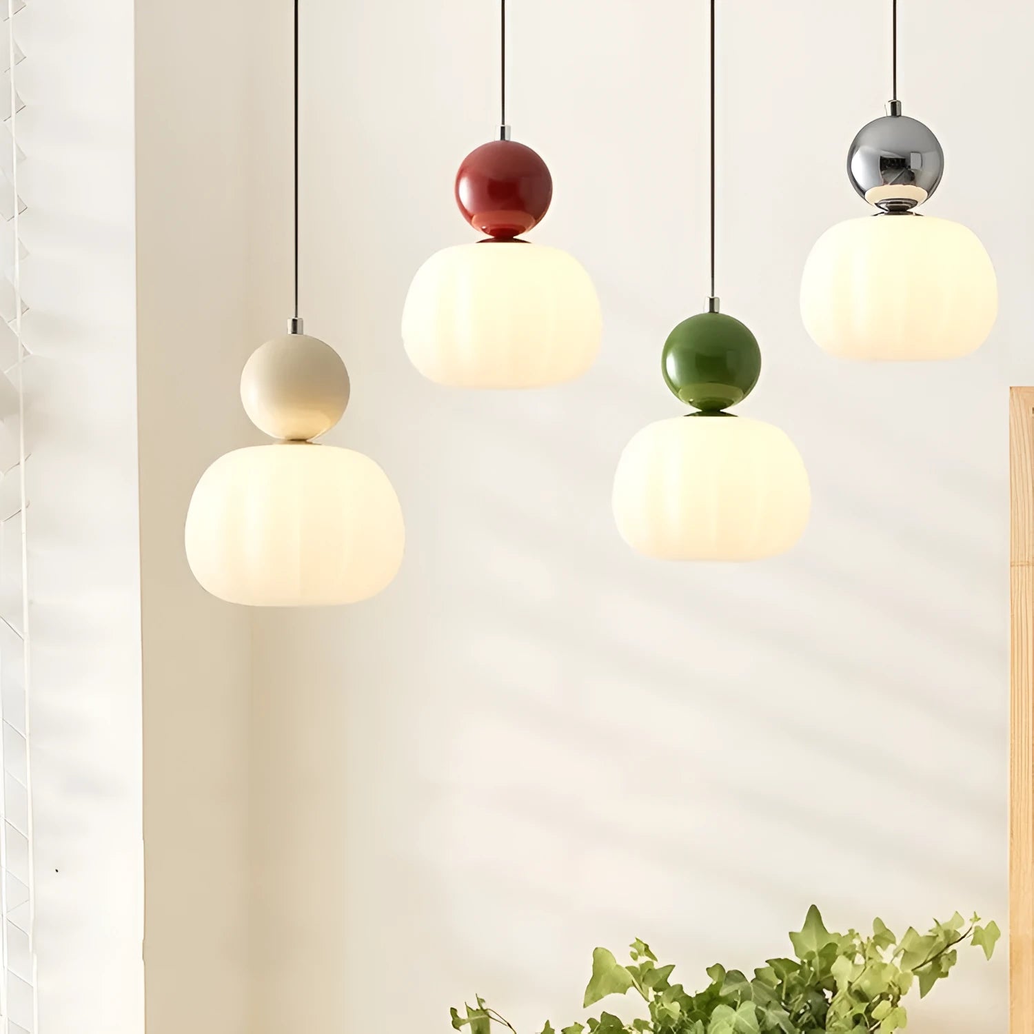 Nordic pumpkin-shaped alloy chandelier for ceiling mounting in a bedroom or dining room.