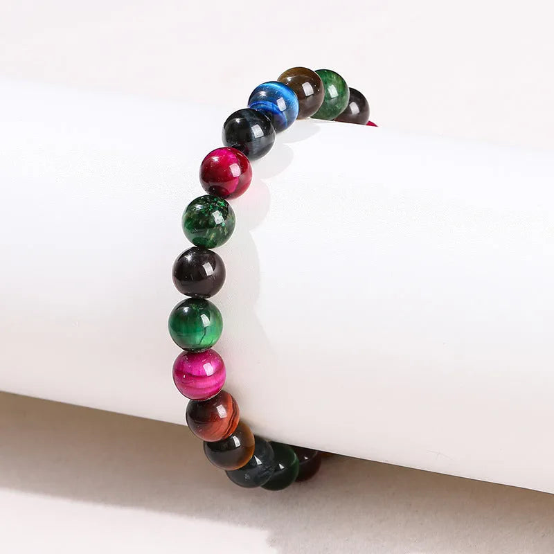 Colourful Tiger Eye women's bracelet with round beads in 6mm, 8mm, 10mm, and 12mm sizes on a mixed string.