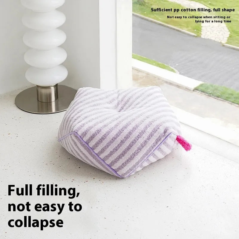 Striped plush pet bed for cats and dogs with a removable washable cover in yellow, orange, or purple.