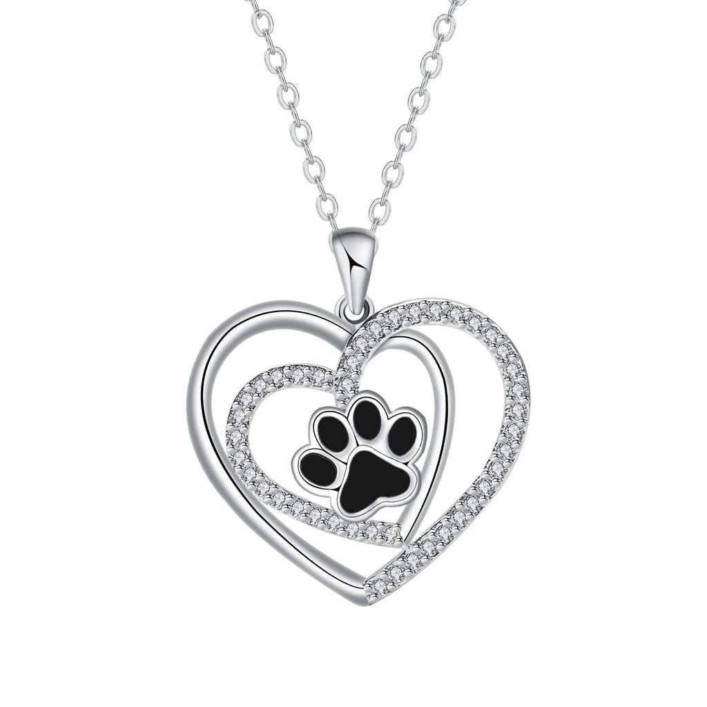 Dog paw print necklace with heart-shaped pendant on cross chain for women