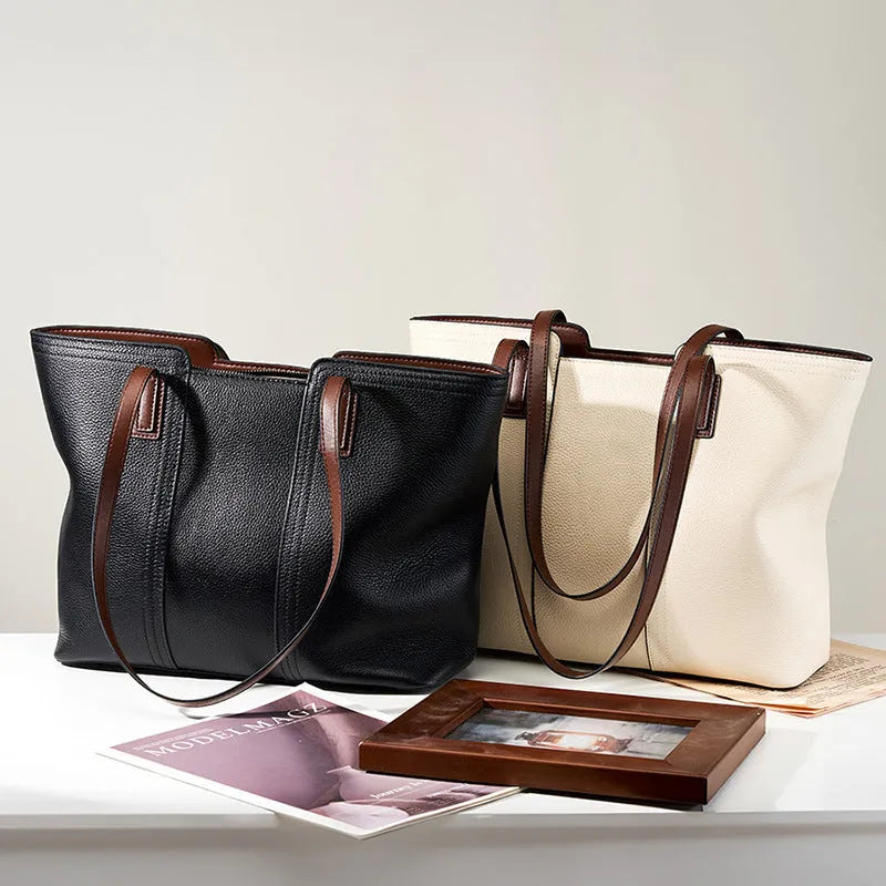 Women's black genuine leather crossbody commuter bag with large capacity and internal organisation compartments