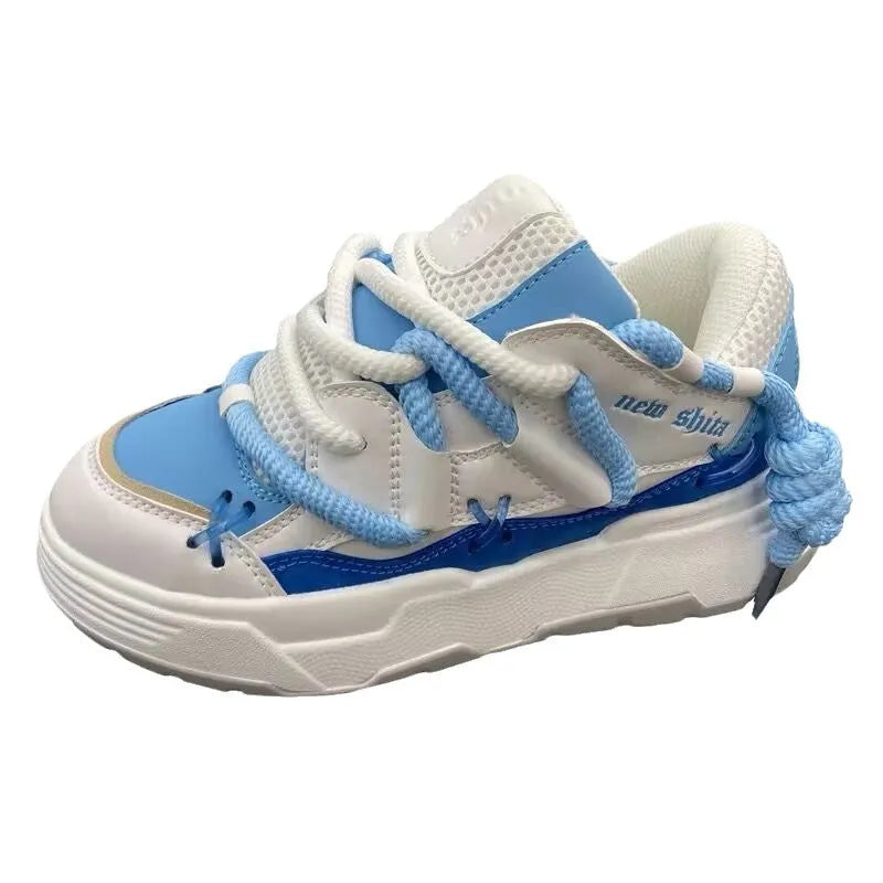 Women's chunky platform sneakers with 6-8cm heel in grey, showing round toe and front tie-up closure