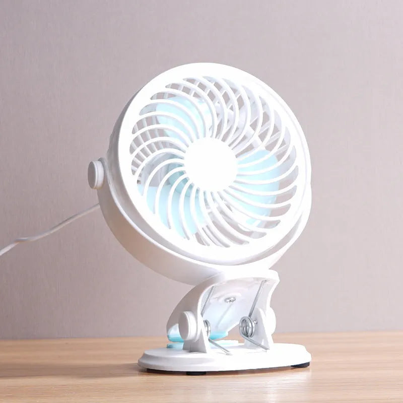 Compact USB desk fan with clip attachment and three blades for quiet personal cooling