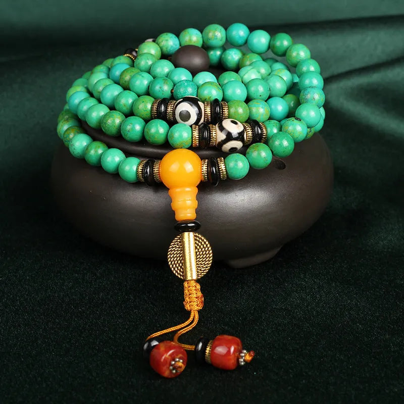 Natural turquoise bracelet with 108 round 8mm beads in national style.