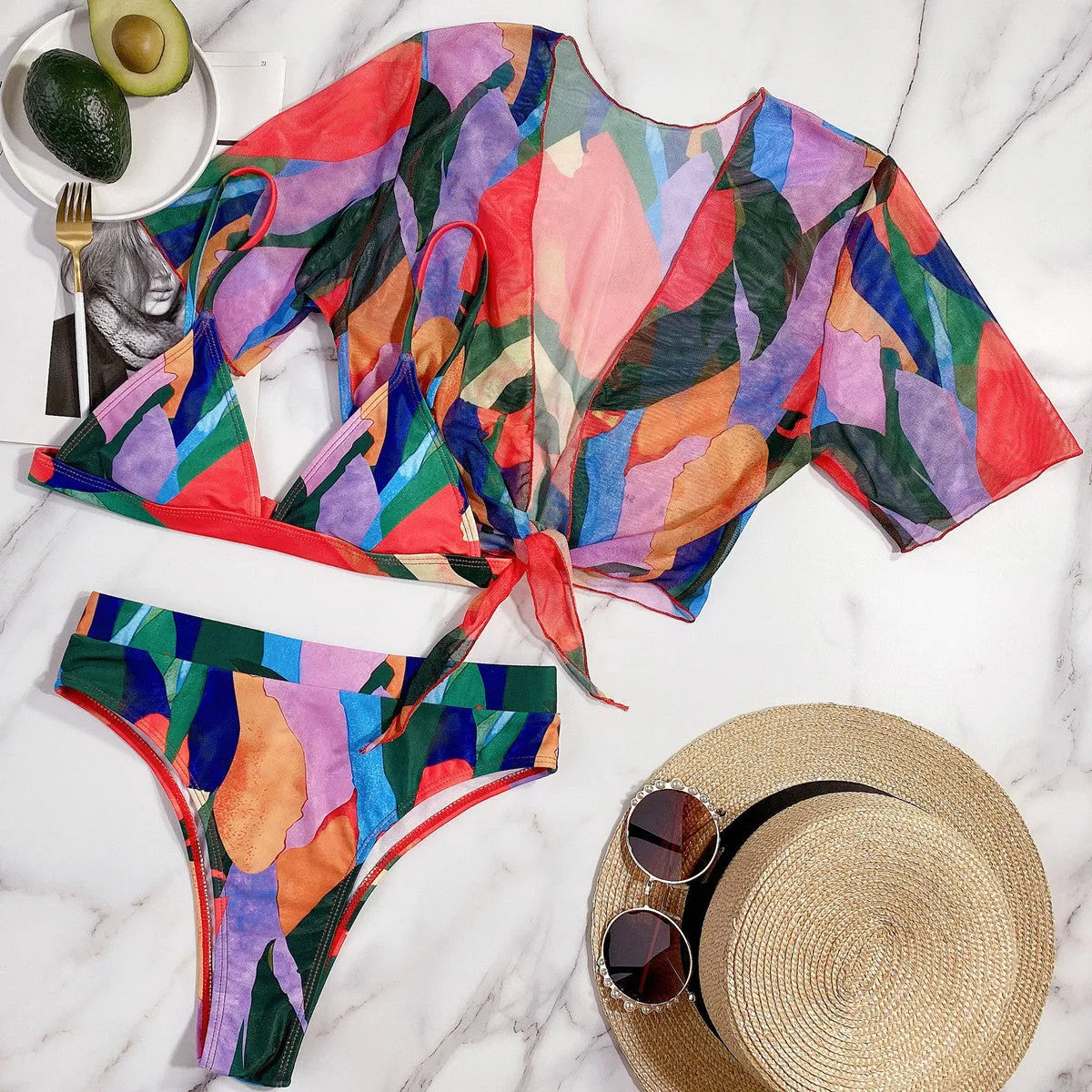 Red women's printed split swimsuit with triangle bikini briefs for swimming and surfing.