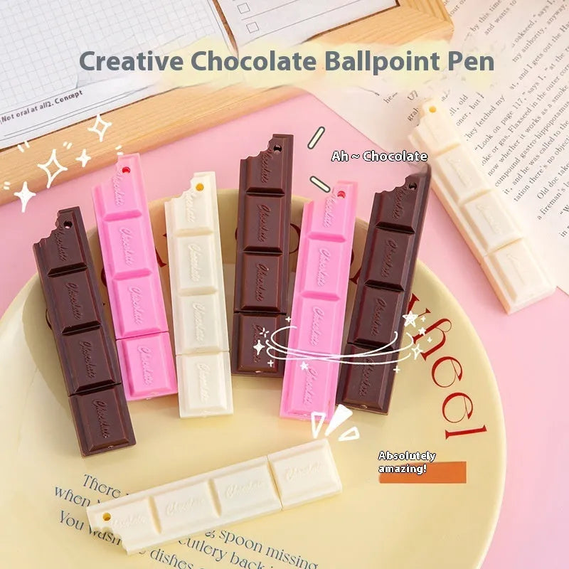 Chocolate ballpoint pen with cartoon food design in pink, beige, and brown colours