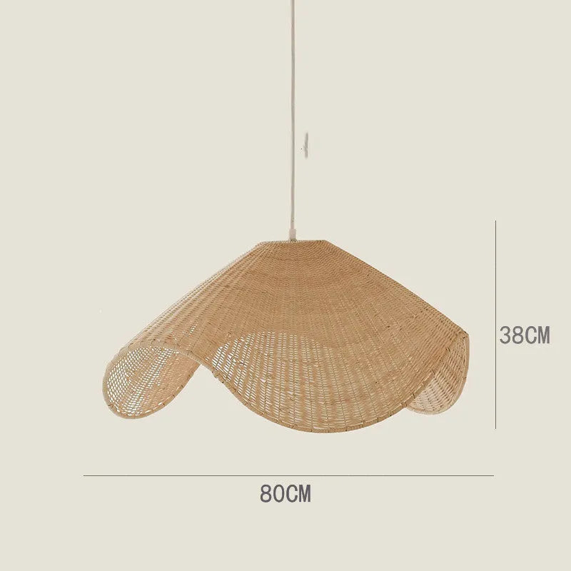 Handwoven straw rattan and willow bamboo pendant ceiling lamp with warm white LED light.