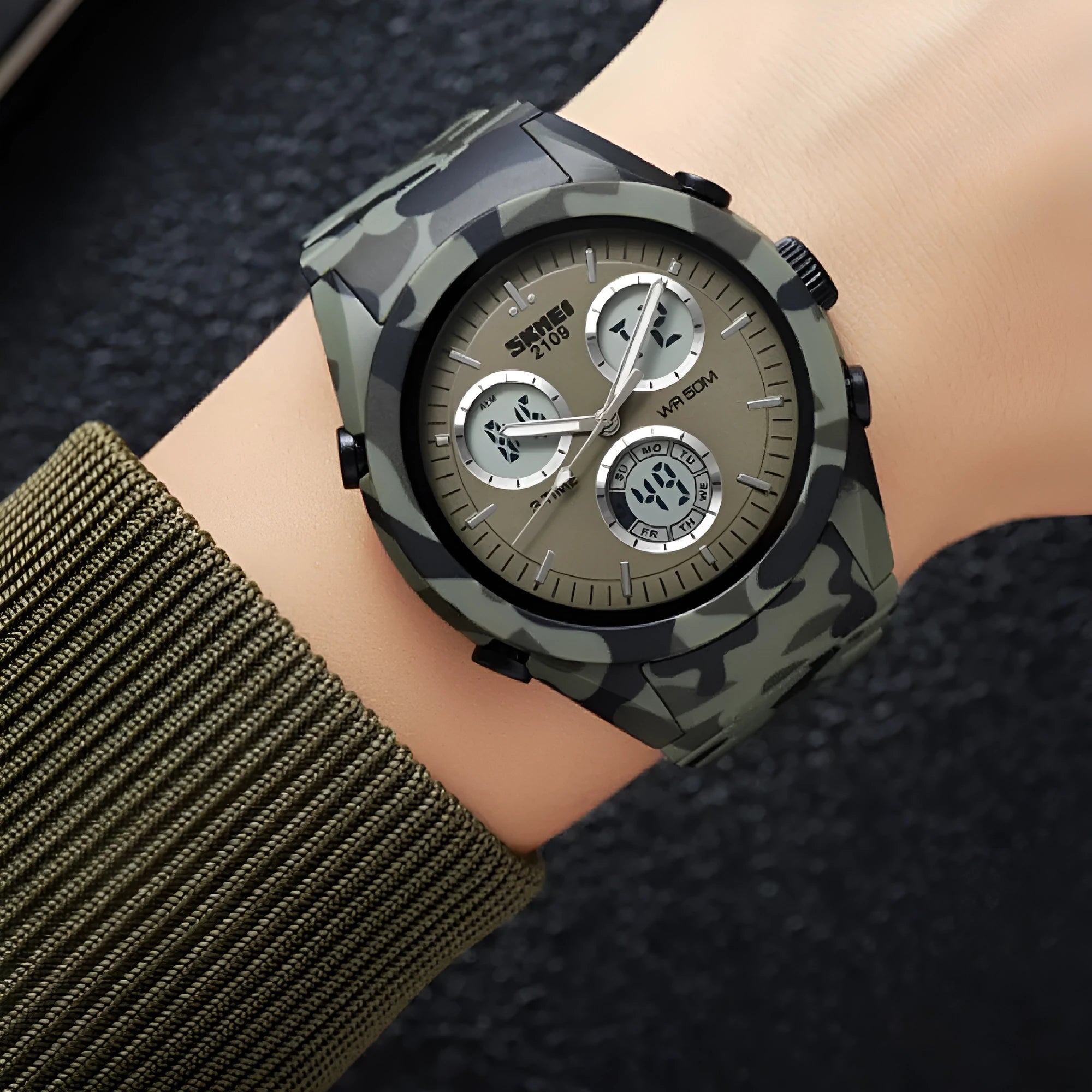 Unisex electronic casual watch with camouflage strap and resin mirror, showing stainless steel side button.