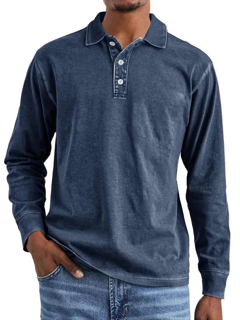 Man wearing a retro washed distressed cotton lapel long sleeve polo shirt in army green.