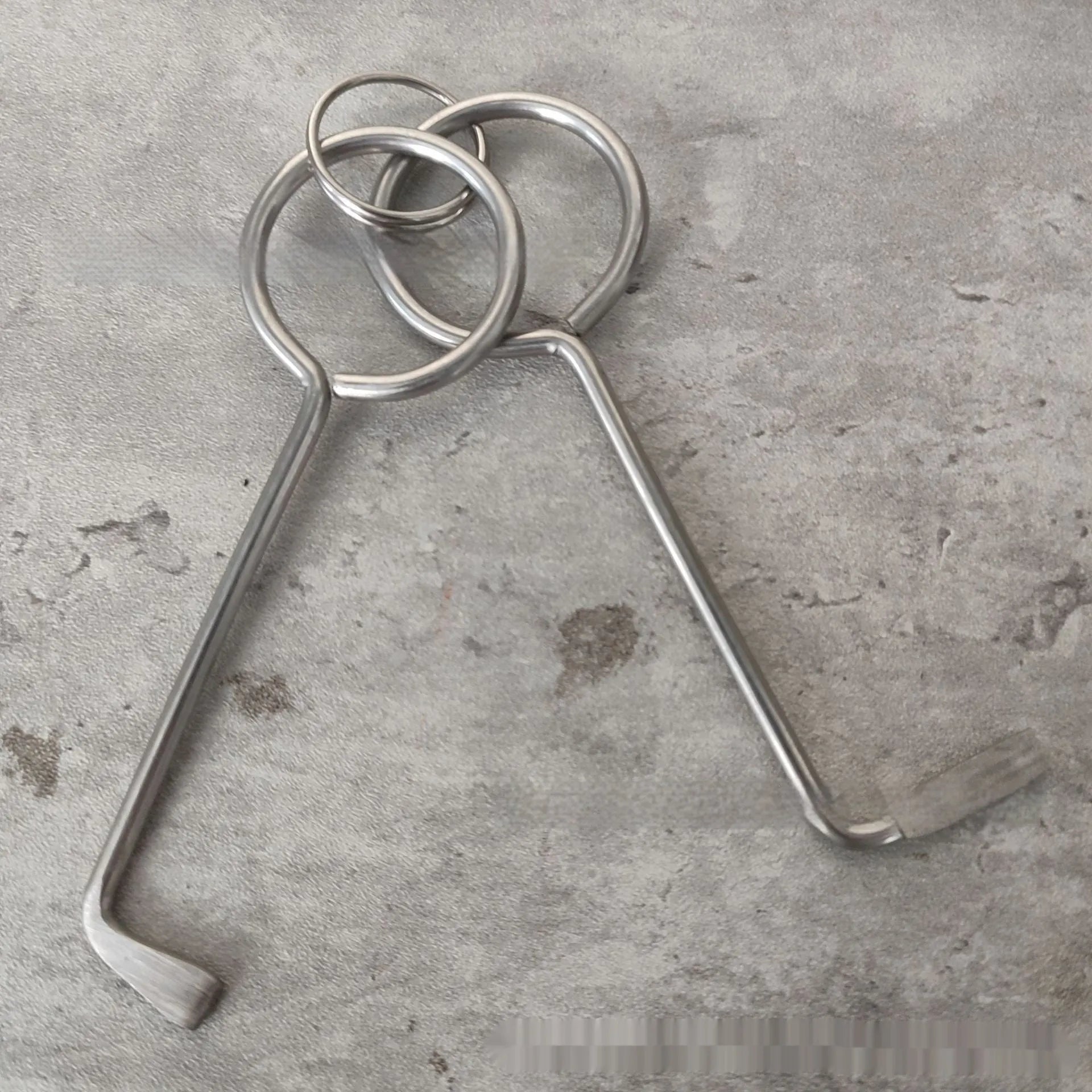 Two alloy steel wrench tools from a portable universal tool set for household and mechanical use
