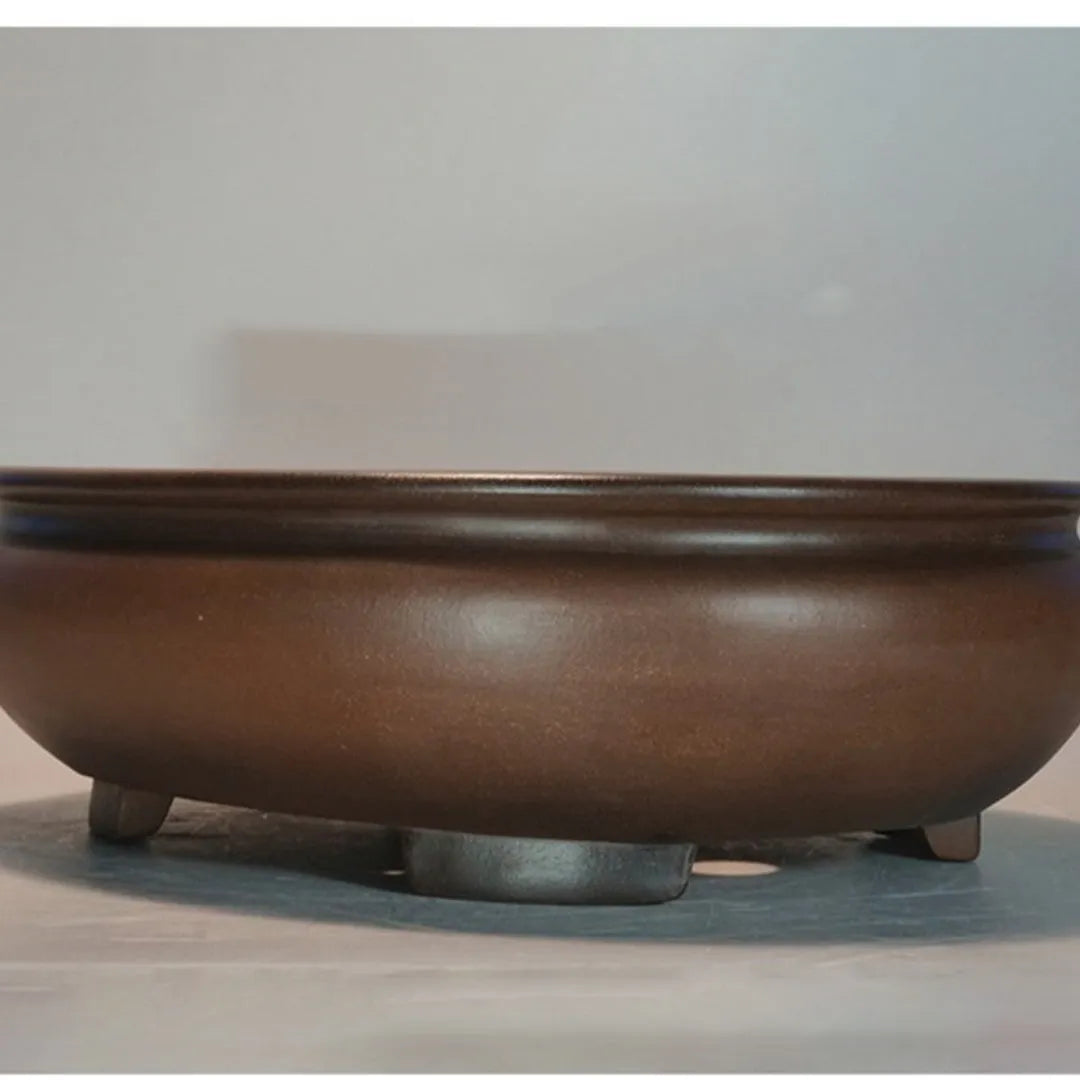 Purple clay handmade classical desktop flowerpot measuring 58 cm long by 47 cm wide.