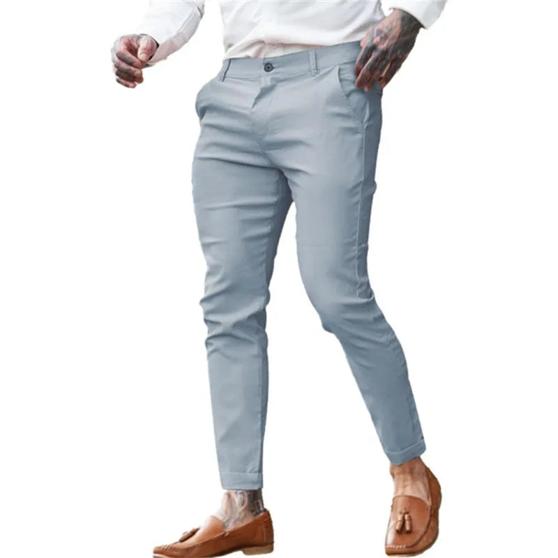 Men's slim fit stretch cotton twill pencil trousers in a choice of solid colours.