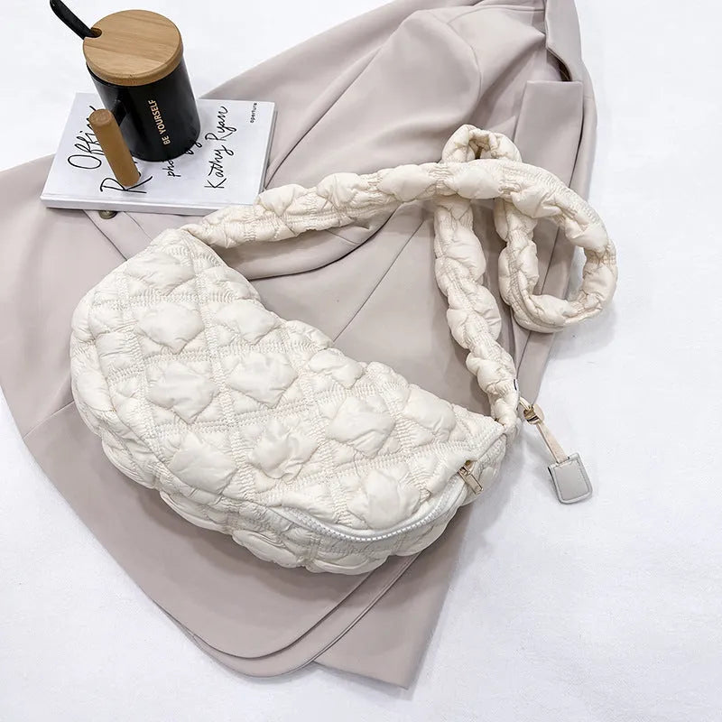 Women's nylon shoulder messenger bag in a solid colour with a long strap, showing front view.