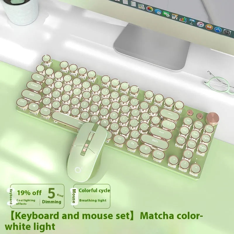 Matcha green mechanical gaming keyboard with white backlighting, aluminium panel, and multifunction knob on desk