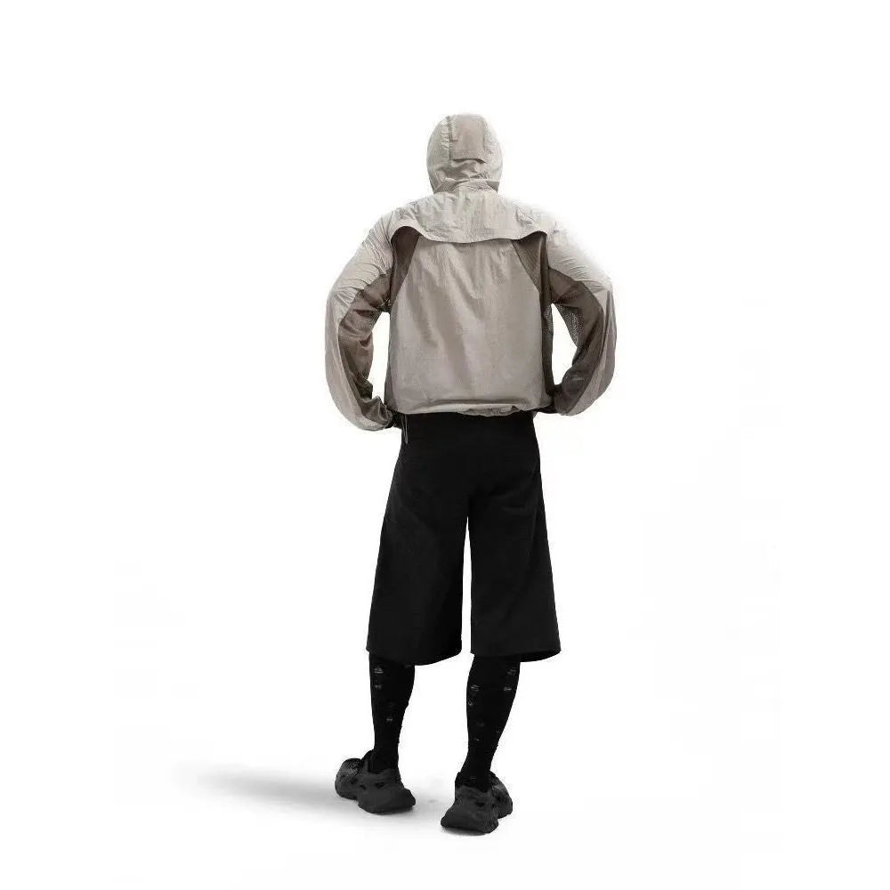 Thin nylon sun protective top with mesh stitching in desert brown colour
