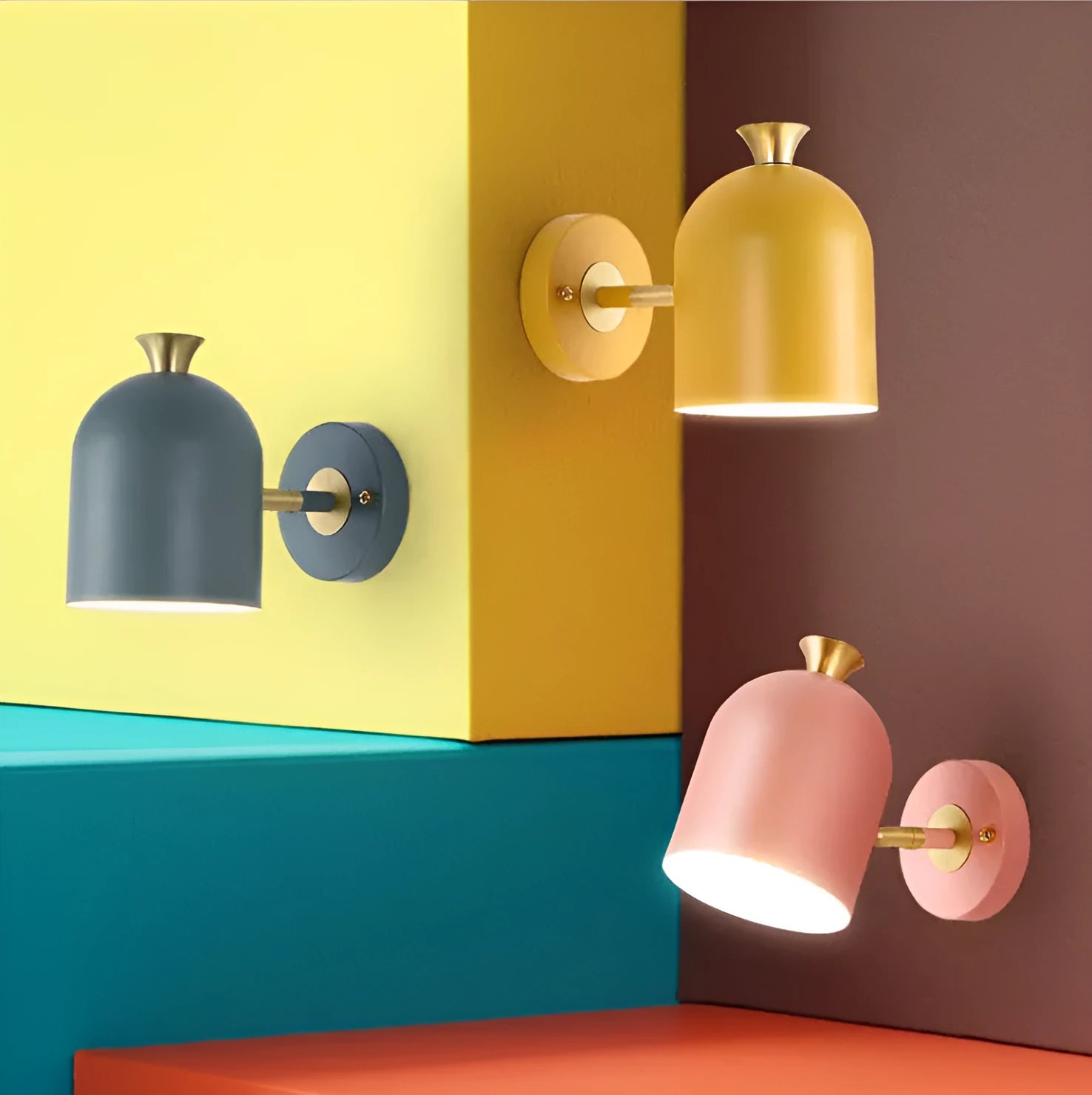 Circular aluminium bedside wall lamp with mirror front in choice of blue, green, pink or yellow finish