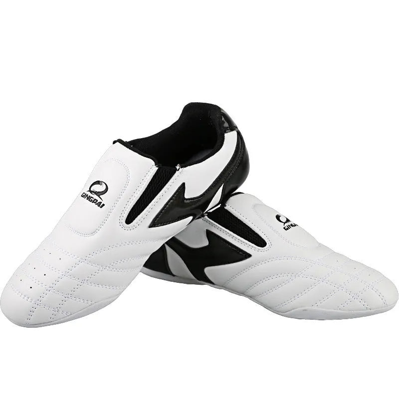 Black and white children's PU martial arts training shoes with soft sole for Taekwondo and Sanda.