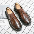 Men's black and brown artificial PU leather brogue business shoes with round toe.