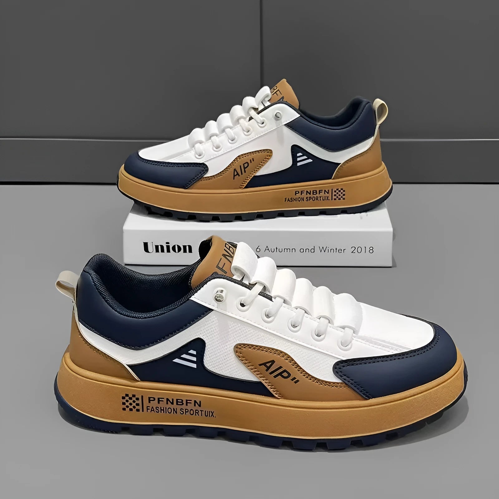 Men's white casual trainer with artificial PU upper and round toe, shown in orange, black, and brown trim colour options.
