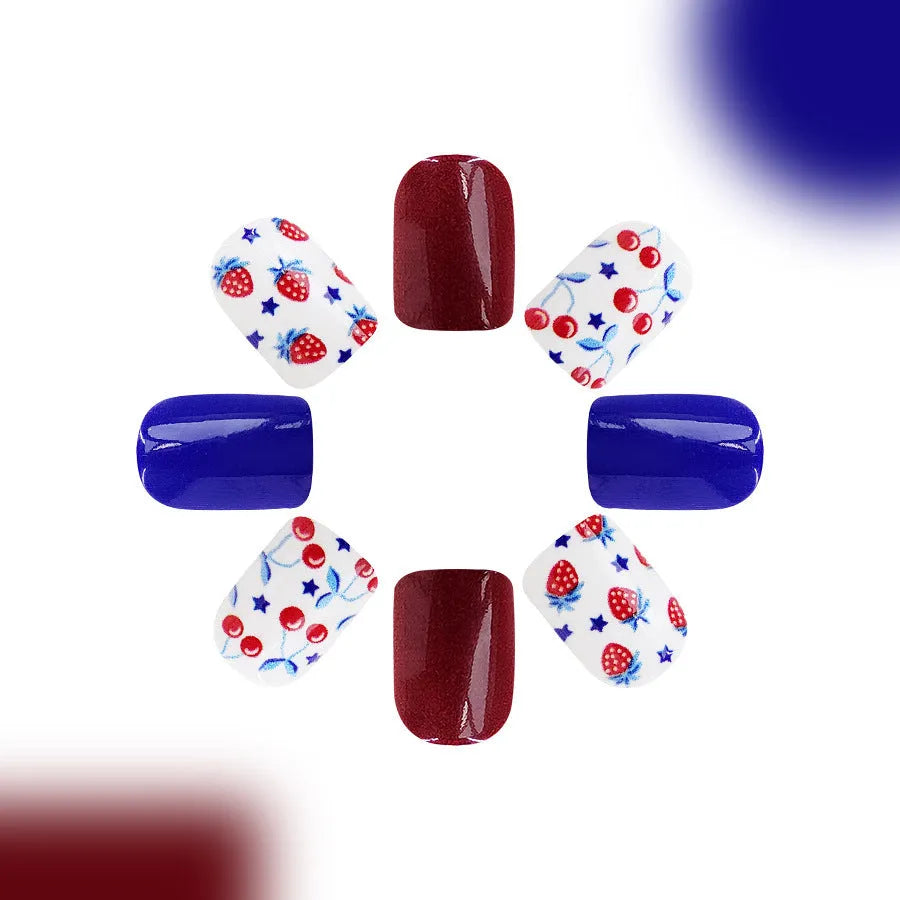 Short glossy false nail stickers with red and blue strawberry cherry design for Independence Day