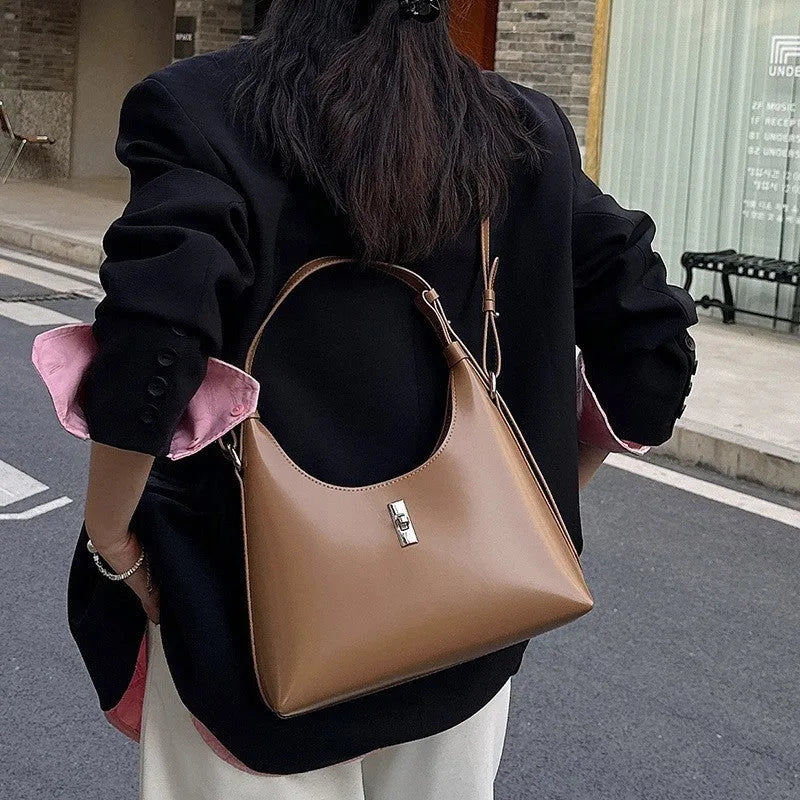 Genuine leather crossbody shoulder bag in dumpling shape with external sandwich pocket