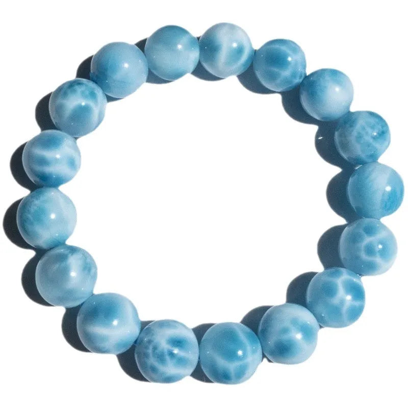 Blue Bodhi bead bracelet with natural crystal stone and pearl accents in Maillard style