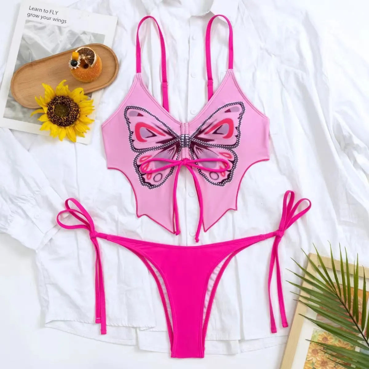 Women's sleeveless split bikini set with bow detail in multiple colour options