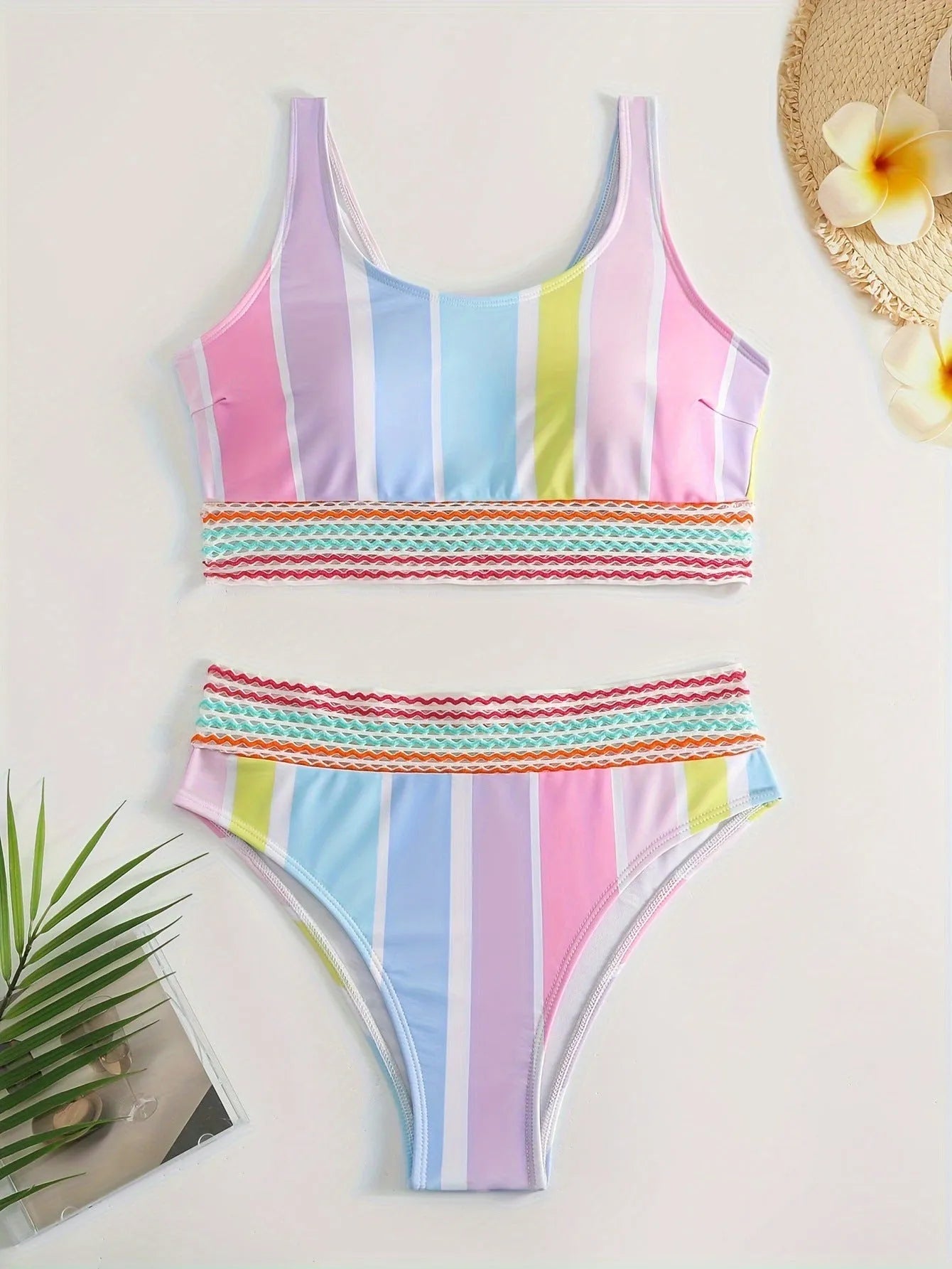 Women's striped bikini set with top and briefs for swimming and sports.