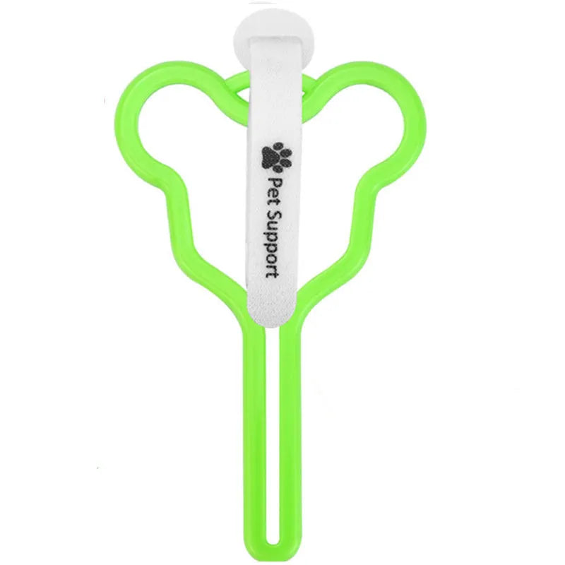 Hands-free dog poop bag holder with black velcro strap and clip attached to a dog leash.