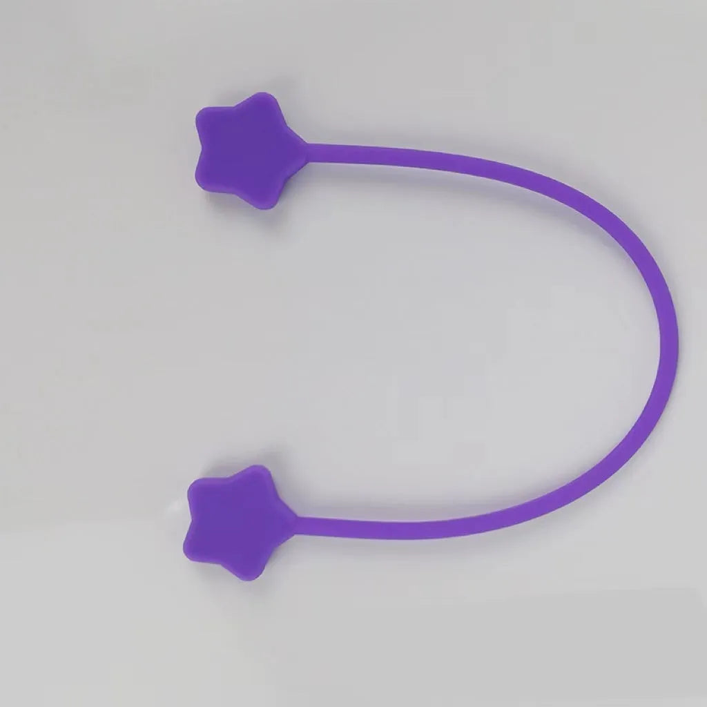 Star magnet silicone wire winder clip in various colours showing wire organisation function