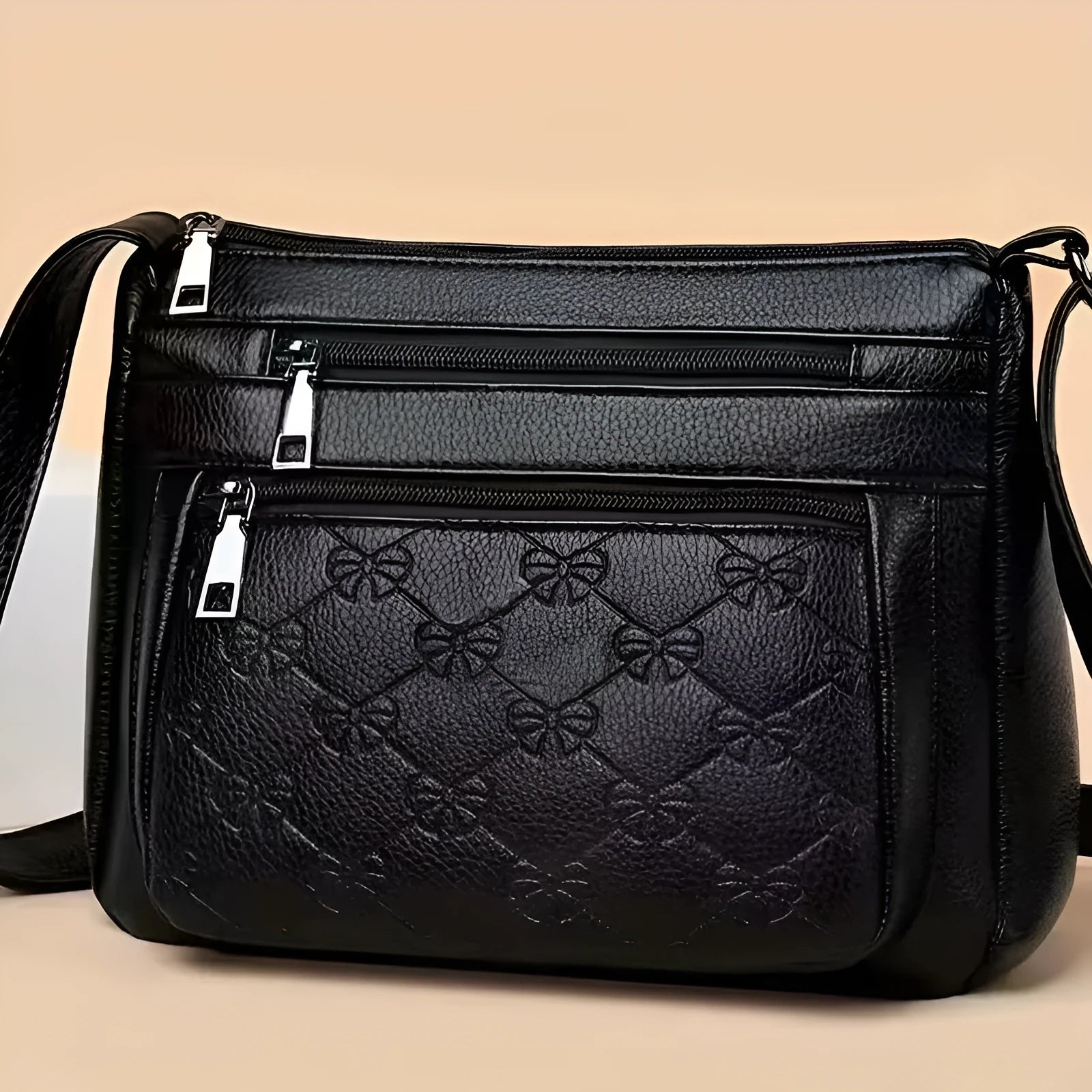 Butterfly black PU leather women's crossbody messenger bag with embossed design and horizontal square shape