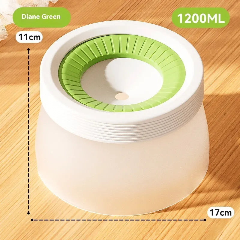Green suspended non-spill water bowl for dogs and cats, showing the elevated bowl above the base plate