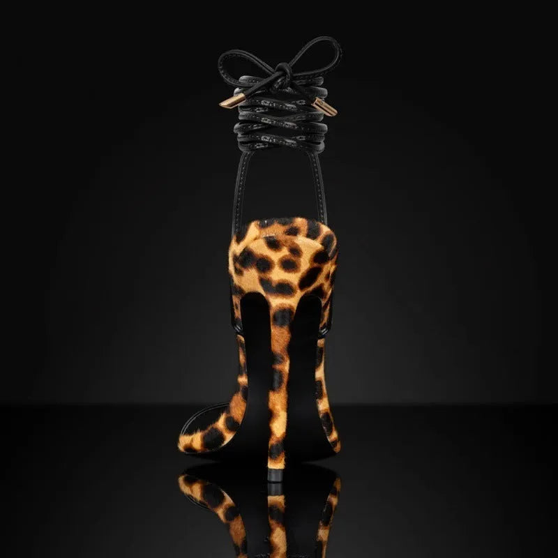 Women's leopard print pointed toe sandals with Roman lace-up ankle strap and buckle closure