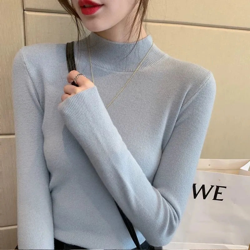 Slim fit long sleeve knitted top in viscose fibre available in multiple colours with Western style design