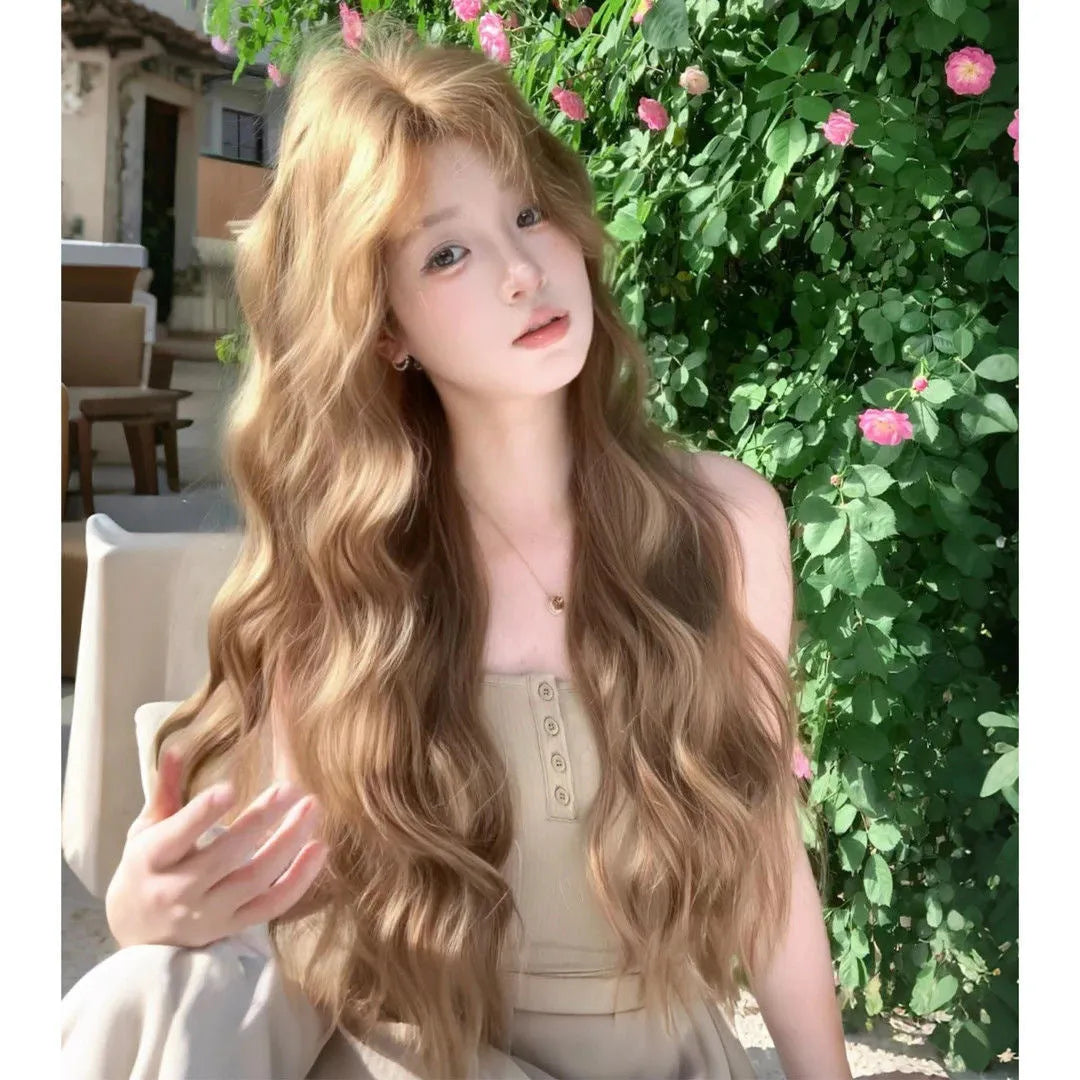 Brown synthetic curly wig of medium length with an attached hair net.