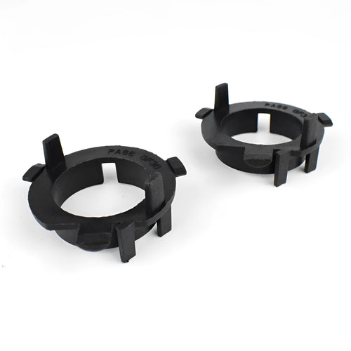 Black ABS plastic car headlight card holder for Nissan and Kia models showing compact size