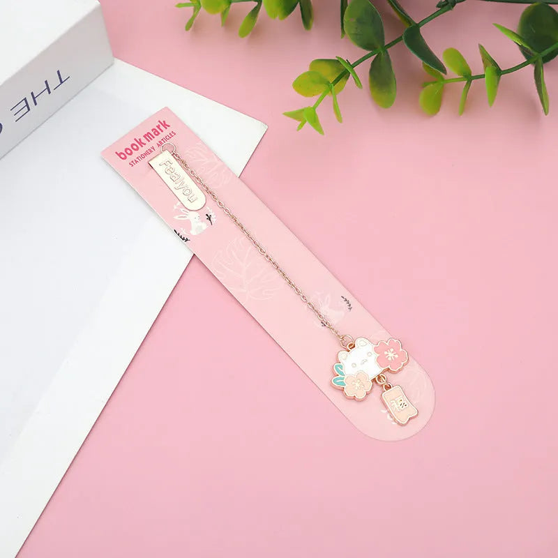 Creative cartoon metal pendant bookmark featuring cherry blossom cat and rabbit designs.