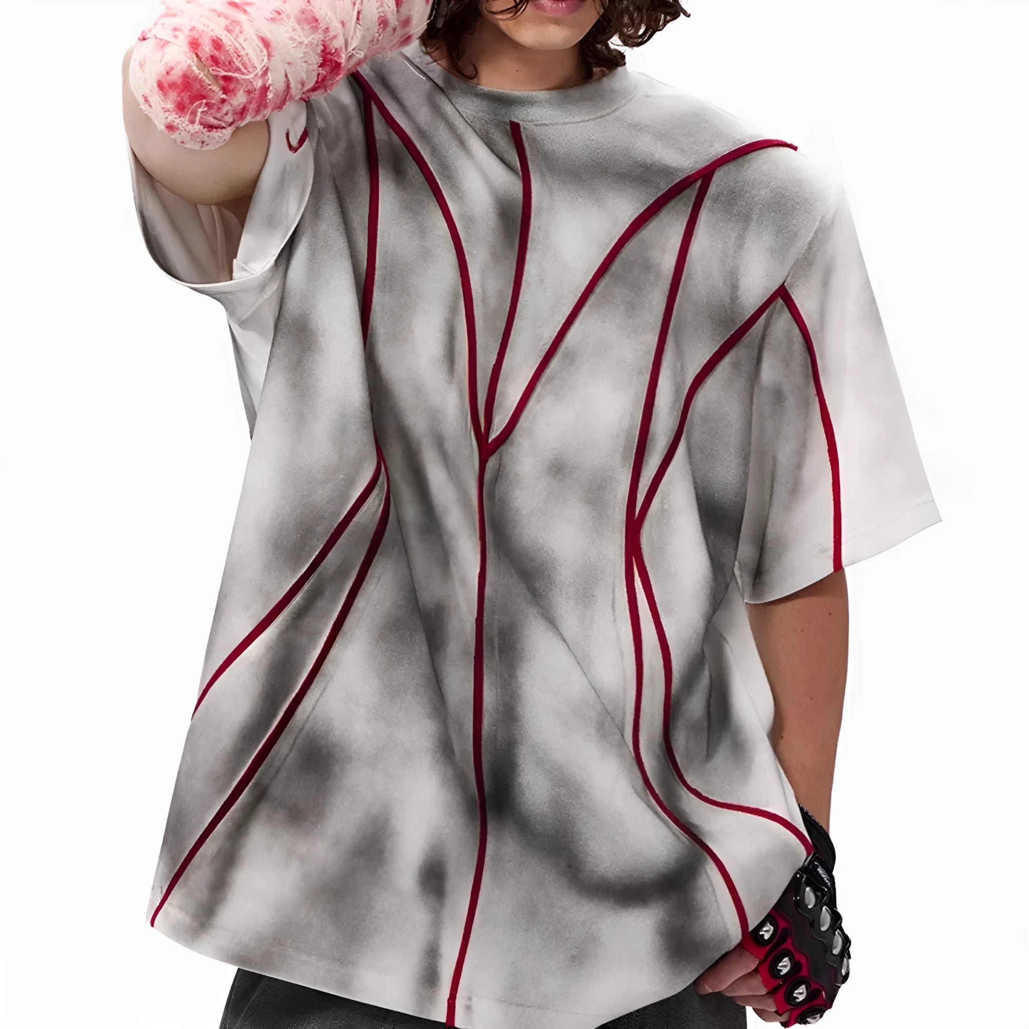 Women's padded shoulder T-shirt with textured line patchwork detail on the front.