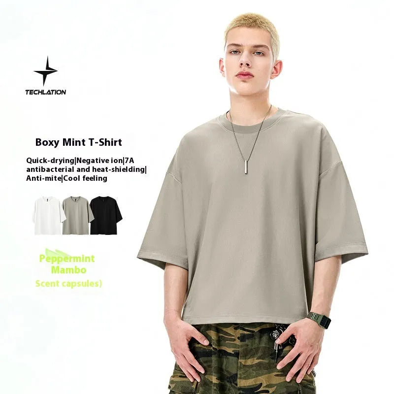 Men's sand grey loose fit short sleeve pullover shirt made from cotton-polyester blend fabric