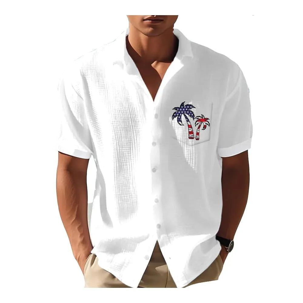 Man wearing a loose fit, short sleeve Hawaiian shirt with a colourful digital print pattern.