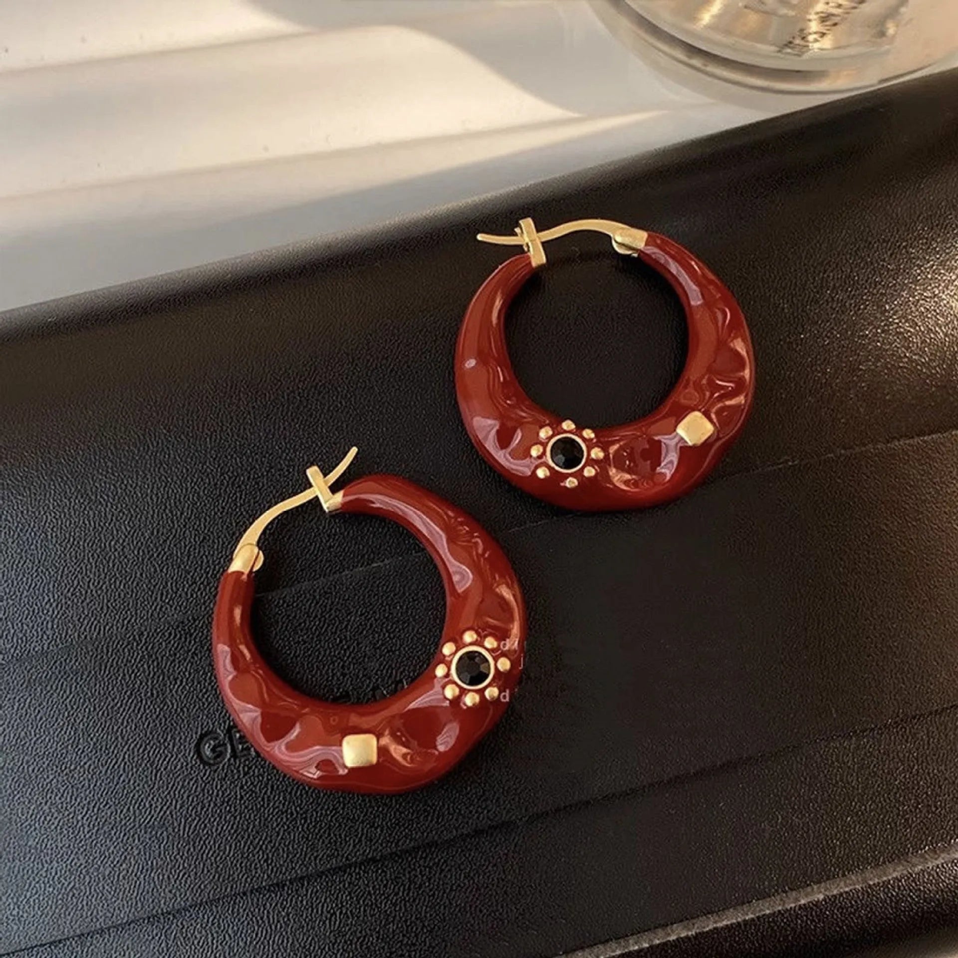 Hong Kong style retro alloy ear studs with dripping oil finish and rhinestone inlays in black and red