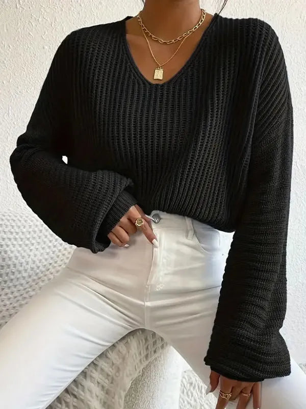 Women's solid colour long sleeve loose pullover in black, pink, green, blue, or red.