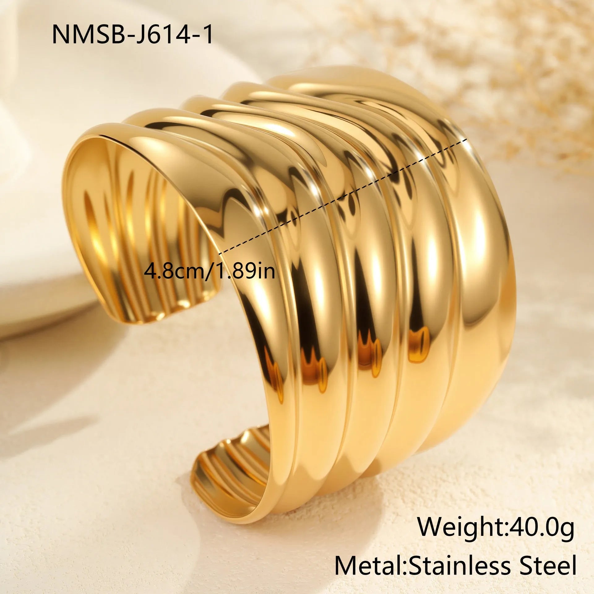 Women's fashion bracelet with gold-plated wave design and geometric elements