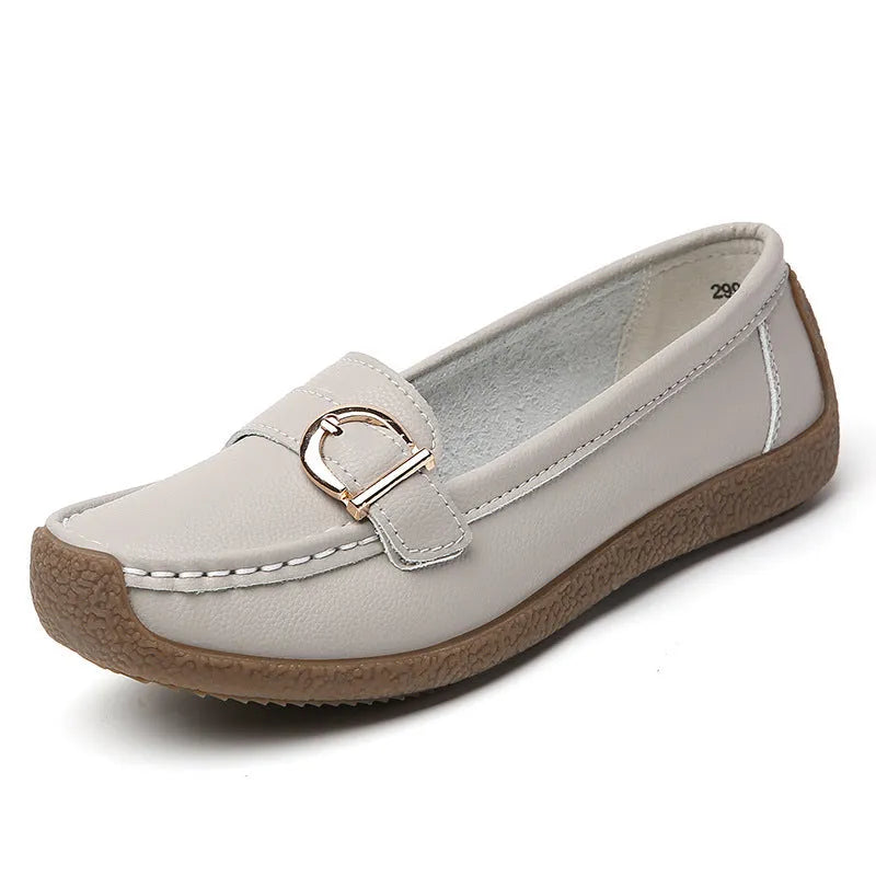 Women's casual flat loafers in artificial PU leather with a rounded toe and beef tendon sole.