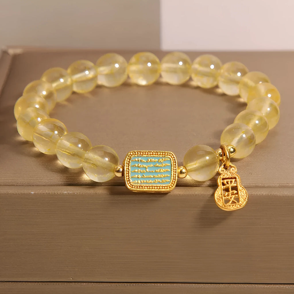 Women's yellow citrine crystal bracelet with rhinestones on adjustable 7-inch band