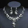 Women's fashion necklace and earrings set in gold or white with alloy construction and floral pattern
